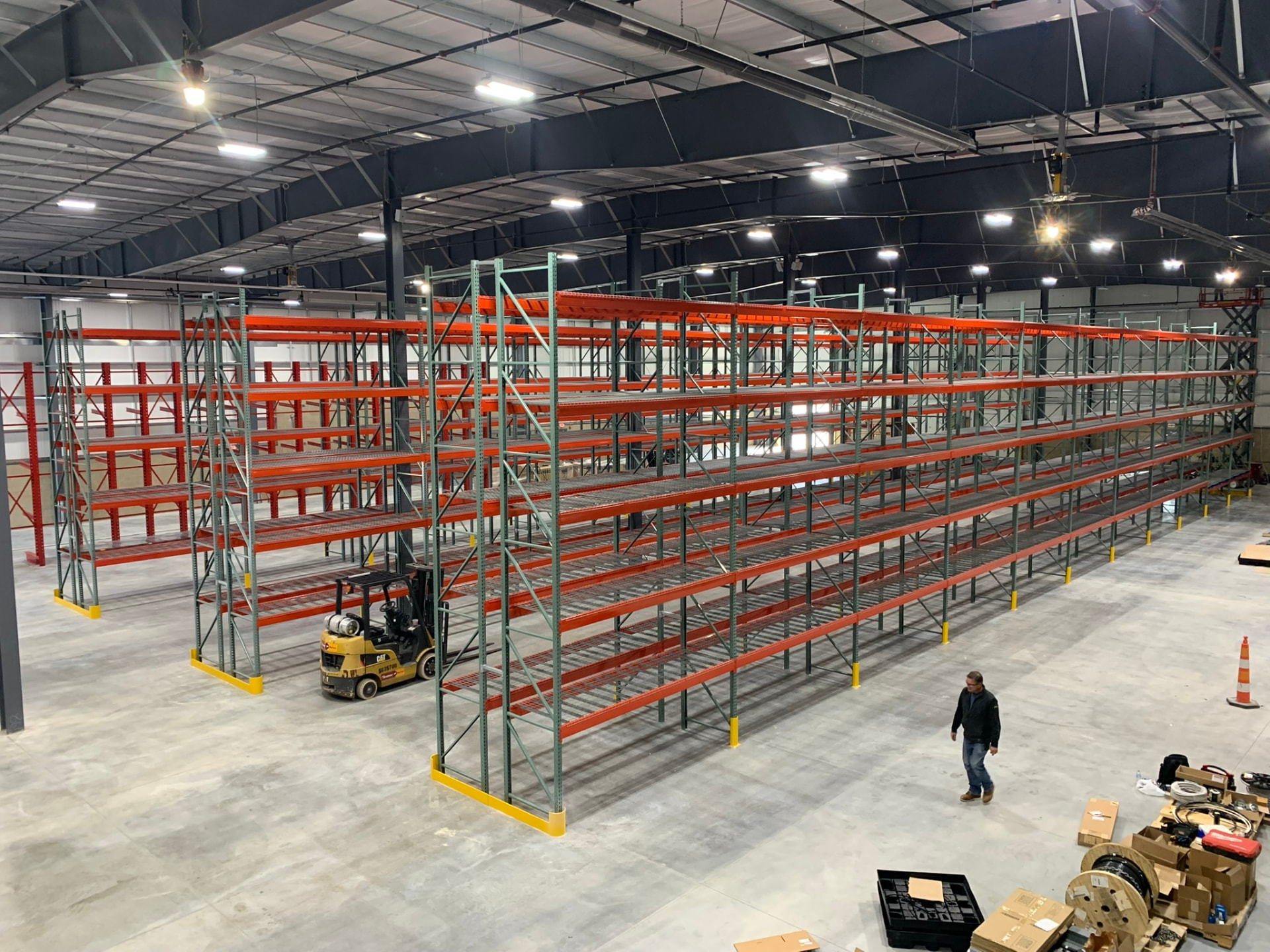 Newly installed pallet rack rows in an empty warehouse